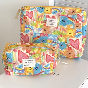 Quilted cotton makeup bag set with colorful sun and rainbow graffiti patterns