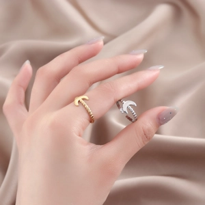 French vintage titanium steel moon ring plated in 18k gold worn on hand over silk