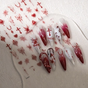 Gothic stiletto press-on nails with red white gradient, butterflies and crosses