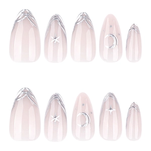 French short almond press-on nails with 3D silver moon and star designs on nude pink