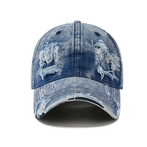 Vintage washed blue denim baseball cap with distressed rip details for men and women