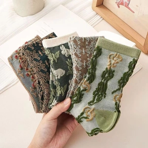 Set of four vintage 3D relief mid-calf socks with retro floral and forest animal patterns