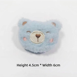 Close-up of a blue plush bear patch showing 4.5cm height and 6cm width dimensions