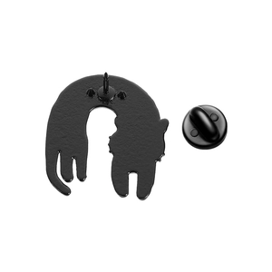 Detailed back view of a black enamel pin with a durable metal butterfly clutch fastener