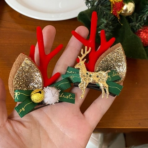 Christmas reindeer antler hair clips with red velvet bows and Merry Christmas ribbons