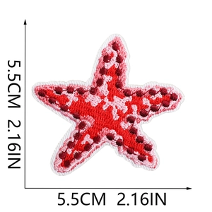 Detail view of starfish embroidery patch with red threads and size markings 5.5cm