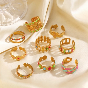 9-piece gold-plated stainless steel ring set with colorful enamel drip oil designs