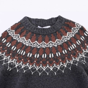 Dark grey crew neck knit sweater with classic Fair Isle pattern and geometric jacquard design