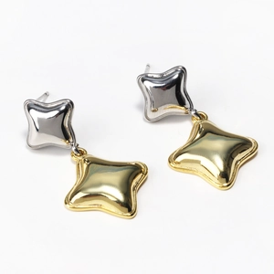 Elegant gold and silver dual-tone irregular starfish stud earrings on a white background