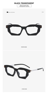 Detail view of bold geometric frames with black and white color-blocking temples and rivets