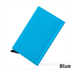 Close-up of blue aluminum RFID blocking credit card holder with automatic slide lever