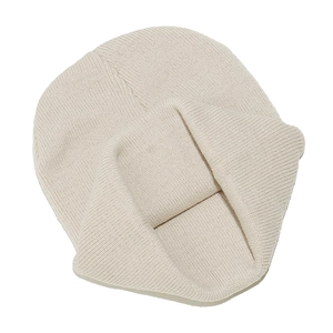 Close-up of beige knitted beanie featuring ribbed fold-over cuff and soft thick texture