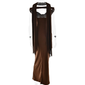 Detail of brown strapless long dress paired with a matching sheer chiffon neck scarf