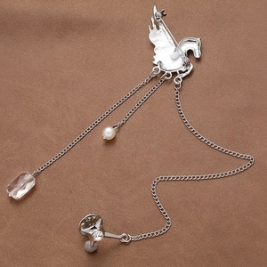 Silver Pegasus brooch with triple tassel chains and pearl accents showing back pin structure
