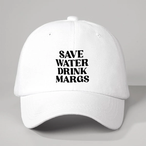 Detailed view of Save Water Drink Margs slogan printed on a white cotton baseball cap