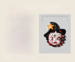 Macro detail of hand-painted resin nail art charms featuring witch character design