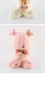 Detail showing plush teddy bear decor on fluffy winter fleece hat and scarf set for kids