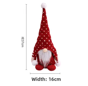 Dimensioni dettagliate dello gnomo di Natale in maglia rossa alto 37cm e largo 16cm