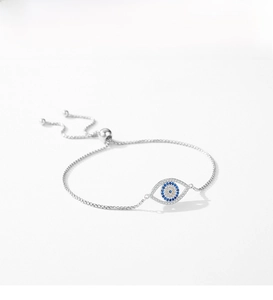 Detailed view of 925 sterling silver evil eye bracelet with adjustable slider clasp