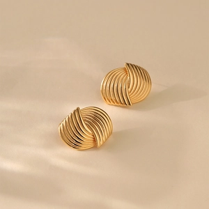 Irregular gold-plated stud earrings with vintage spiral swirl texture for women