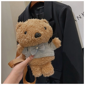 Brown plush teddy bear crossbody bag shown as a daily outfit accessory