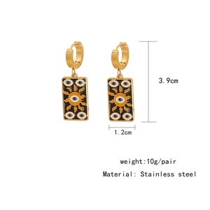 Detailed view of stainless steel rectangle sun and evil eye drop earrings with measurements