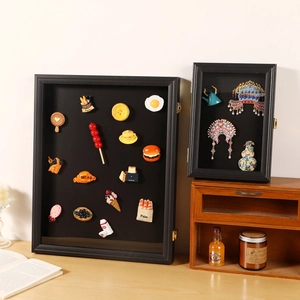 Black wooden shadow box frames with glass front for displaying photos and enamel pins