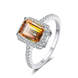 Macro shot of 1 carat emerald cut amber moissanite ring set in S925 sterling silver