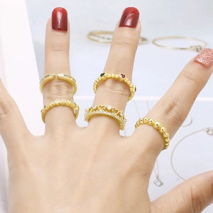 Gold plated ring set with heart shape zircon and crown designs on woman's hand