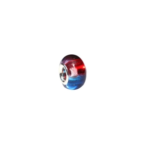 Detailed macro view of red and blue swirl resin bead with silver large hole metal core