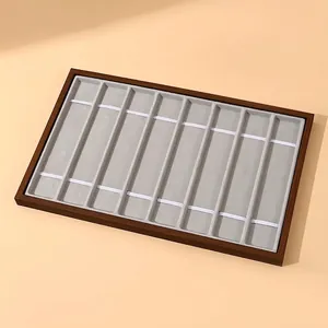 10-slot black walnut wood grain watch display tray with grey velvet lining and elastic bands