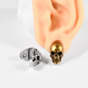 Gothic skull magnetic earrings in gold and silver showing inner magnet and fit on ear