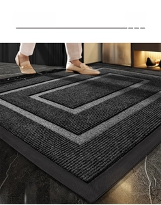 Macro shot of durable rubber entrance mat with striped anti-slip texture and grey border
