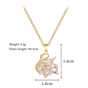 Detail showing swan pendant dimensions 2.6x1.8cm and chain length of 40+5cm