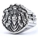 Detailed macro view of vintage silver steel ring with shield emblem and warrior engraving