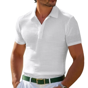 Detail of white waffle texture fabric and button polo collar on men's short sleeve shirt