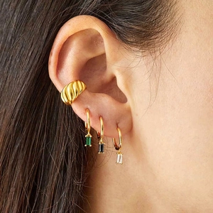 Gold plated geometric ear cuff and earring set featuring multi-color zircon crystals