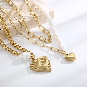 Double layered gold titanium steel necklace with freshwater pearls and heart pendants