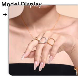 Detail view of gold and silver stackable geometric rings with micro-pave cubic zirconia
