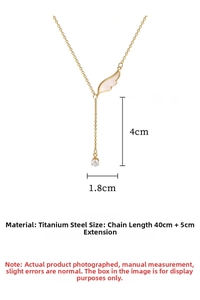 Detailed size specifications for a titanium steel angel wing pendant with round cubic zirconia