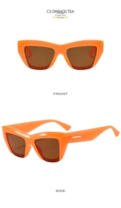 Detailed front and side views of orange cat-eye sunglasses with tea-tinted lenses