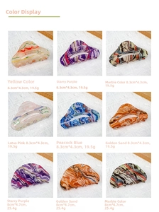 Nine colorful oil painting style acrylic hair claws showing marble textures and sizes