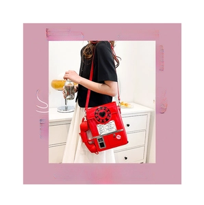 Creative red retro telephone crossbody bag with dial details and detachable handset