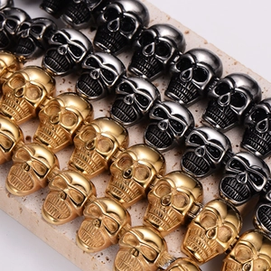 Vintage stainless steel skull bracelets in gold and gunblack colors with polished finish