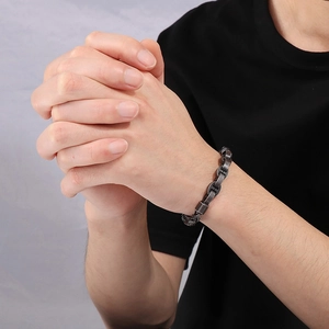 Men's titanium steel keel chain bracelet in gunmetal grey finish worn on wrist