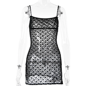 Detailed texture of black lace mini dress with side slit and delicate spaghetti straps