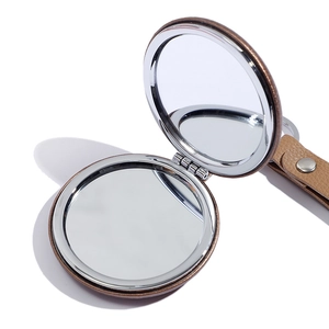 Mini portable brown leather folding compact mirror with hanging strap and snap closure