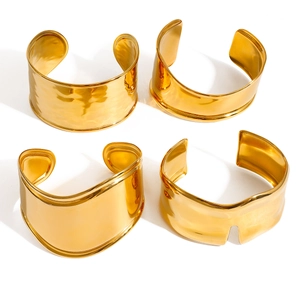 Irregular wide open gold stainless steel bangles set in polished mirror finish