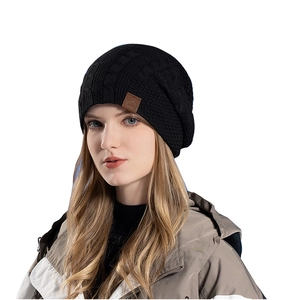 Winter thermal knit beanie for women with ear protection and thick fleece lining in black