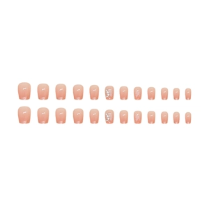 Faux ongles dégradés nude avec motifs papillons 3D et décorations de perles
